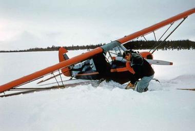 Digging an airplane out of the snow.jpg