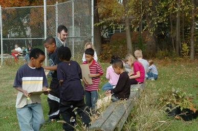 Students learn about schoolyard habitats.jpg