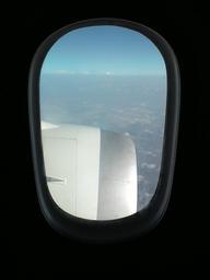 airplane-window-flight-flying-525438.jpg