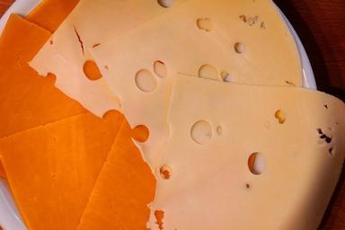 cheese-holes-cheese-plate-yellow-509073.jpg